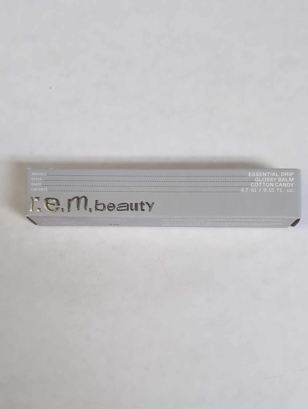 REM beauty Cotton candy ESSENTIAL DRIP GLOSSY BALM
